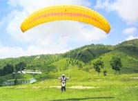 Paragliding activities being conducted on the outskirts of Pitthoragarh town.