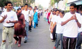 Hearing-impaired persons take out a rally on the occasion of International Deaf Day in Dehradun on Sunday.