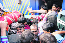 Labourers leave for their homes to celebrate Diwali.