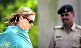 Actress Julia Roberts arrives for the shooting of her film Eat, Pray, Love at Mirzapur village in Haryana on Sunday.