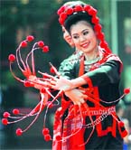 Thai dancers perform in traditional costumes at a shopping mall during Destination Thailand festival in New Delhi on Sunday.