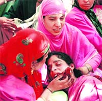 grieving relatives of the woman who was also killed in the encounter. 