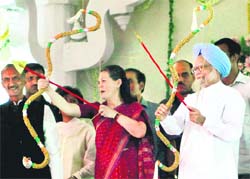 PM Manmohan Singh and UPA chairperson Sonia Gandhi during Dussehra celebrations at Ramlila Maidan in New Delhi on Monday.