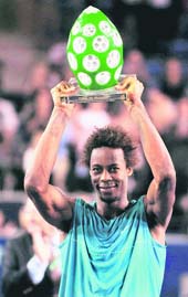 Gael Monfils holds his trophy after defeating Philipp Kohlschreiber in the final of the ATP Open de Moselle tennis tournament in Metz, eastern France on Sunday. 