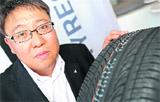 DJ Lee, GM of Kumho Australia, unveils the world's first scented car tyres in Sydney on Tuesday. The Aroma Technology tyre by South Korean tyremaker Kumho gives-off a lavender scent when the rubber compound is warmed up by road friction. 