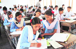 Girls take part in the painting competition held in Jammu on Tuesday.