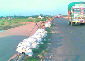 A bridge on the Jammu-Pathankot highway, near Chadwal village, with a broken sidewall