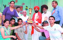 The boys team of Police DAV holds the overall trophy in athletics.