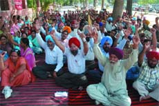 Members of Democratic Teachers Front (Punjab) stage a dharna in support of their demands in Bathinda on Wednesday.