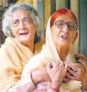 Two elderly women at the Sector 15 old-age home on Wednesday.