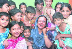 Asma Khan with children from her hostel.