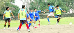 A match of Dehradun Football League in progress on Wednesday.