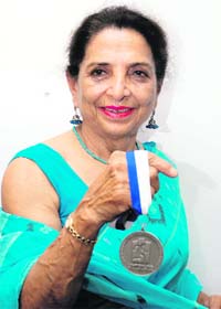 Bhopinder Banta Singh with the victory medal
