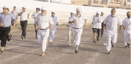 Senior citizens take part in a race at the Sports Stadium in Bathinda on Thursday.