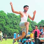  A player in action during the athletics meet at Sports Complex, Sector 42, 