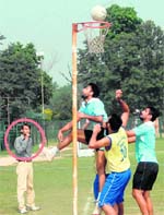A referee conducts the match without wearing the prescribed uniform on PU ground in Chandigarh on Thursday.