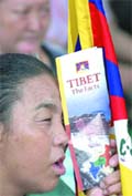 A Tibetan woman protests against China in New Delhi on Thursday.