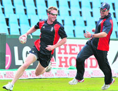 Englands Paul Collingwood (L) and Andrew Strauss take part in a training session on Thursday prior to their semifinal against Australia at SuperSport Park in Centurion.