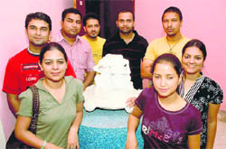 Students of the Department of Gandhian Studies, PU, in a cheerful mood as they pose with the three wise monkeys