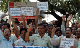 Parents of children studying in private schools demonstrate against hike in school fees in Faridabad on Friday.