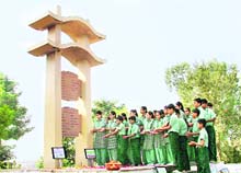 Students of Greenland School pay tributes to Mahatma Gandhi on his birth anniversary at Gandhi Smarak near the Sutlej in Phillaur on Friday. 