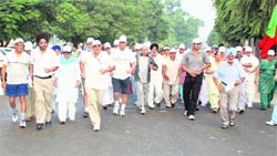 Senior citizens take part in the Run for Fun organised by Sat Paul Mittal School to celebrate the Elders Day on Thursday. 