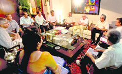 HRD Minister Kapil Sibal meets representatives of the IIT faculty regarding their demands in New Delhi