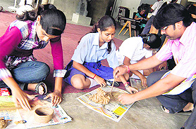 Dr Vishal Bhatnagar teaches clay modelling to schoolchildren at a workshop organised by the Museum and Art Gallery in Chandigarh on Saturday.