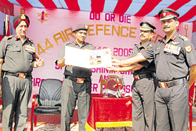 Lt Gen Ram Pratap, Director General, releases the first day cover on the diamond jubilee function of 144 Air Defence Regiment at Ambala on Saturday.