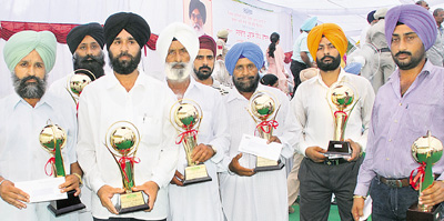 Members of various milk societies who were honoured by Punjab Chief Minister Parkash Singh Badal at Verka Milk Plant, Mohali, on Saturday.