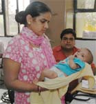Deepak and Rita with their son Jeet.