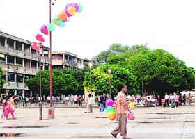 A baloon seller adds colour to the bustling Sector 17 Plaza in Chandigarh