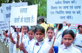 Schoolchildren take part in a march to promote mental health awareness on World Mental Health Day.