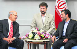 Iranian President Mahmoud Ahmadinejad (R) with International Atomic Energy Agency chief Mohammed ElBaradei in Tehran on Sunday.