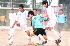A football match being played between students of Aitchison Colege, Lahore, and Bishop Cotton School in Shimla on Sunday.