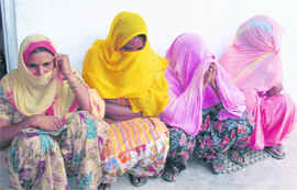 Two of the four accused in police custody at Mullanpur Dakha on Sunday. 