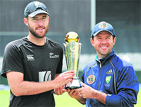 New Zealand Captain Daniel Vettori (L) and Australian Captain Ricky Ponting pose with the Champions Trophy on the eve of the ICC Champions Trophy final at Supersport in Centurion.