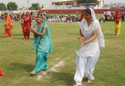 Girls performing a cultural programme during the opening ceremony of the 55th Punjab school games at the Sports Stadium in Bathinda on Monday. 