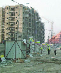 A view of the under-construction Games Village near Akshardham Temple in east Delhi.