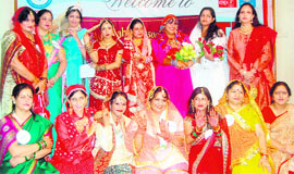 Women during a Karvachauth function in Dehradun on Monday.