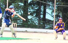 A cricket match between Aitchison College, Lahore, and Bishop Cotton School in progress at Shimla