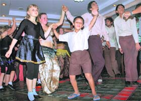 Students of the School for Blind, Sector 26, Chandigarh dance with German belly dancers at a discotheque
