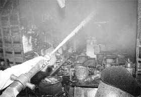 Firemen try to douse the blaze at Apna Bazar in Mohali