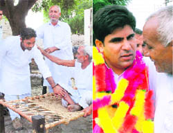 Congress candidates Suresh Dhanda and Anil Dhantori during their tour of various villages in their constituencies.