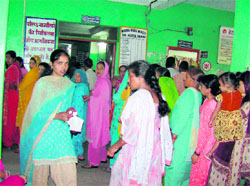 Patients throng the Kangra Civil Hospital OPD with just three doctors to manage the huge rush.