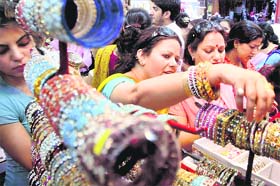 Women select bangles for the Karva Chauth festival in Jammu.