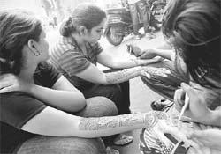 Designs on love: Girls bringing a bit of colour, a dash of fun, a dose of ritual into their lives
