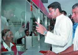 Minister of state for communication and information technology Sachin Pilot inspects the Indraprastha post office at ITO in New Delhi after its inauguration