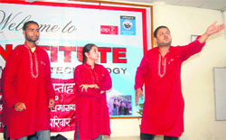 Sambhav Manch artistes perform a play to create awareness about the RTI Act at Sai Institute in Dehradun on Wednesday.