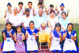 Students of Victoria Public High School, Lehra, near Ahmedgarh, who won the National Karate Championship.